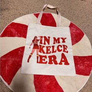 KC Chiefs “In my Kelce era” canvas bag featuring Taylor Swift -like character